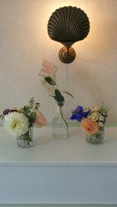 Belair House radiator cover with random vases